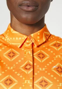 Dena Sleeveless - Débardeur - Orange -J.Lindeberg Boutique 185efacafbb24e50a08685c2cdfa71a5