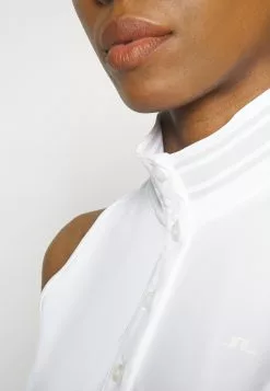 Bettina Top - Polo - White 11 Bettina Top - Polo - White -J.Lindeberg Boutique 1e0e129582ed418e9d0f30fc1c0b37e3