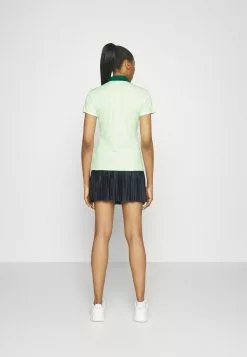 Henrietta Debossed - Polo - Patina Green -J.Lindeberg Boutique 22e9f1aba1a947d1962845e4a6fe4f34