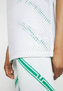 Tina - Polo - White -J.Lindeberg Boutique 70850357fbe64b57afe9aa585b297dc6